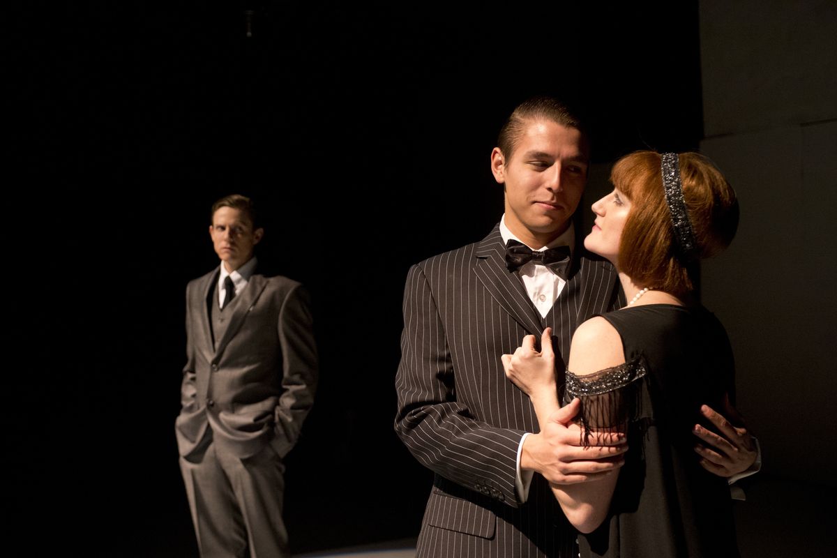 Molly Ovens, right, and Jackson Marchant cuddle while being watched by Nich Witham in “Never the Sinner.”