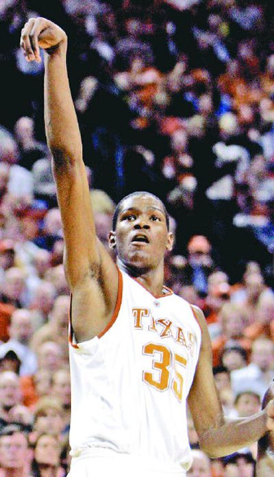 
Standout freshman Kevin Durant has the Texas Longhorns thinking big this year. 
 (Associated Press photos / The Spokesman-Review)