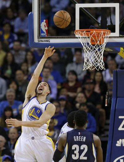 Golden State’s Klay Thompson was near unstoppable in a 37-point first half against Memphis that highlighted a 42-point game. (Associated Press)