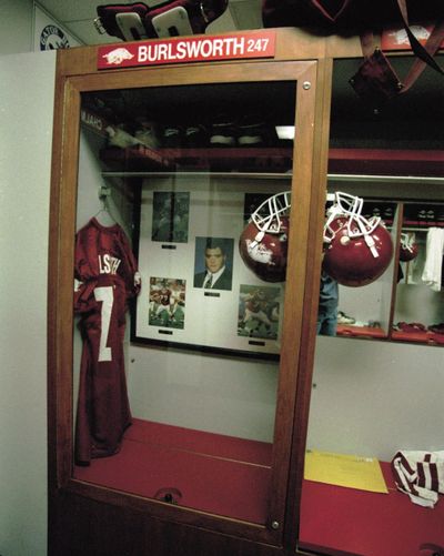 In this 1999 photo, the locker of Brandon Burlsworth is seen encased in glass in the locker room at the University of Arkansas. Burlsworth was killed in a car accident in 1999 after being drafted by the Indianapolis Colts. (APRIL L. BROWN / Associated Press)