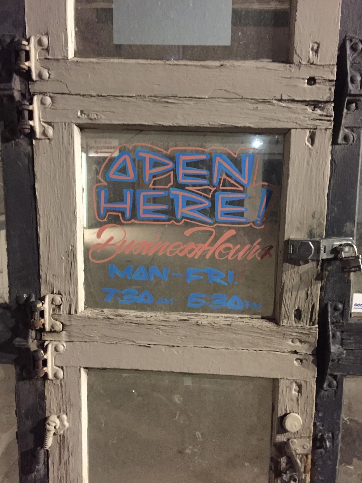 The door of the vacant Watts Automotive shop at 1312 W. First Ave. A brewery and restaurant will soon fill the space. (Nicholas Deshais / The Spokesman-Review)