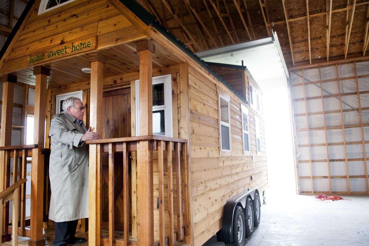 Ian Robertson talks about one of his tiny houses in Otis Orchards on Thursday, December 4, 2015. He’s created The Inland Northwest Fuller Center for Housing, a nonprofit program to have these tiny houses built for homeless people and people in need. (Kathy Plonka / The Spokesman-Review)