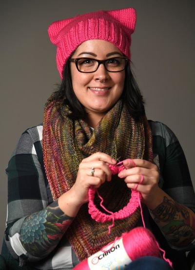 Jenny Love has been knitting cat-eared “Pussyhats” for participants in the Women’s March on Washington to wear, as part of a national project by crafters. (Colin Mulvany / The Spokesman-Review)