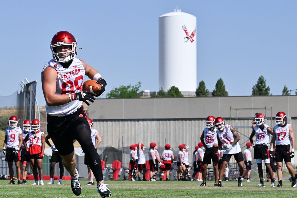 EWU receiver Efton Chism III hauls in a long pass during a college football practice Saturday in Cheney.  (Tyler Tjomsland/The Spokesman-Review)