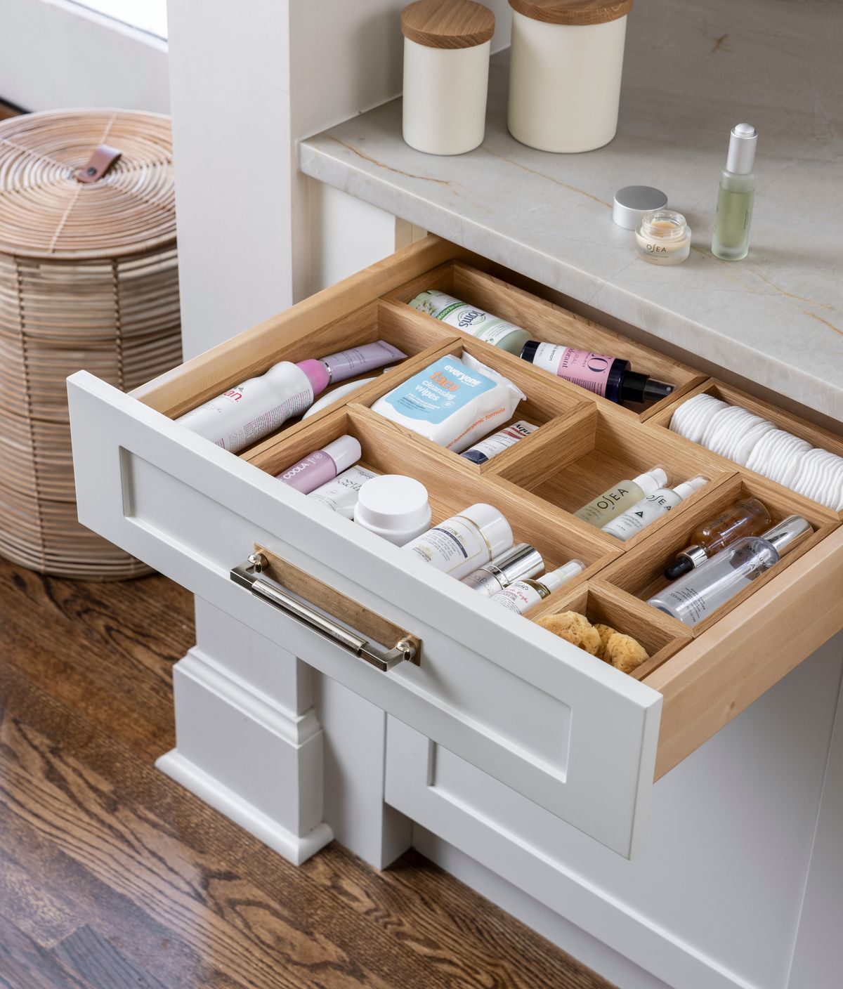 The professional organizers at Neat Method use small bins to group similar items in drawers.  (MARTIN VECCHIO)