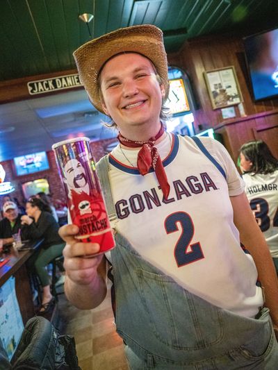At Jack and Dan’s Tavern, Gonzaga student Jonny Golubiec holds a can of Pringles Thursday he won in a drawing with a likeness of Gonzaga University basketball player Drew Timme on the can. Pringles sent three local Spokane bars limited-edition Drew Timme BBQ Pringles Cans encouraging Zags fans to join in on the fun, snack on the crips, enter the sweeps and cheer on the Bulldogs during their game with UCLA.  (COLIN MULVANY/THE SPOKESMAN-REVI)