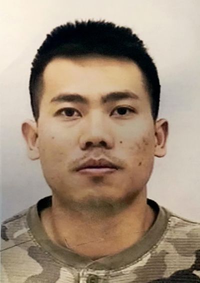 This undated photo provided by the Indianapolis Police Department shows Peter Van Bawi Lian. (Associated Press)