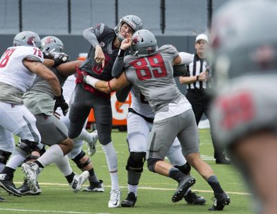 Washington State backup quarterback Tyler Hilinski completed 9 of 14 passes for 133 yards and two touchdowns during April’s Crimson and Gray Game. (Dan Pelle / The Spokesman-Review)