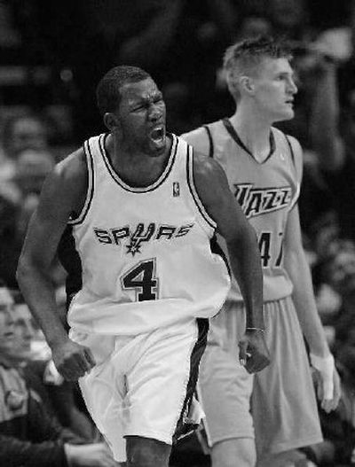 San Antonio's Michael Finley enjoys a successful 3-pointer on Tuesday.
(Associated Press / The Spokesman-Review)
