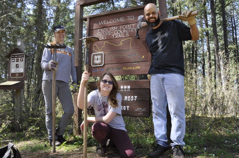 Clover Langdale, Christi Turmes and Joe Turmes of Nampa, Idaho, made a weekend road-trip to Coeur d'Alene to see the countryside and chip in with Idaho Trails Association work project at English Point trails in Hayden.  (Rich Landers)