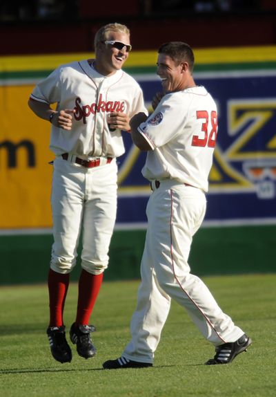 Josh Richmond, left, and Andrew Clark were teammates at Louisville and are now Spokane Indians. (Colin Mulvany)