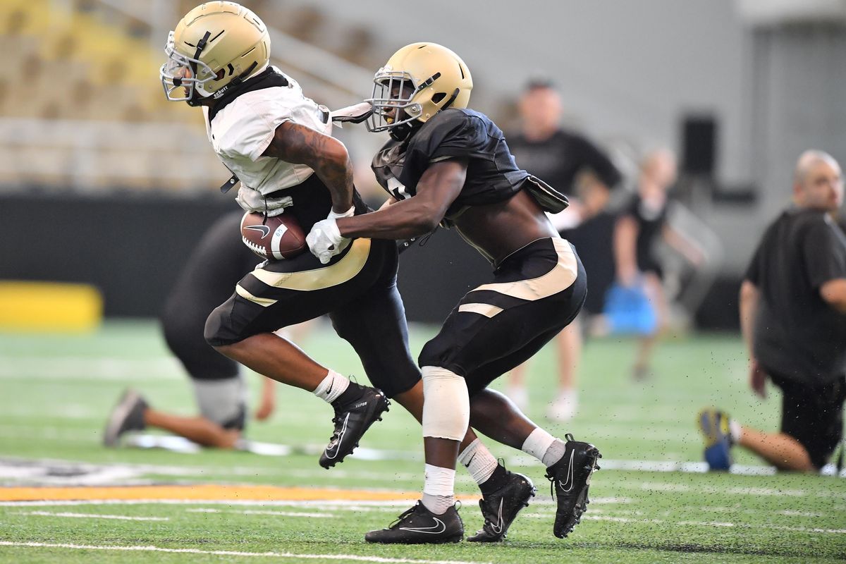 Idaho Vandals wide receiver Dj Lee (11) runs the ball against defensive back Tevin Duke (19) during a practice on Thursday, Aug. 8, 2019, at the Kibbie Dome in Moscow, Idaho. (Tyler Tjomsland / The Spokesman-Review)
