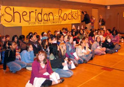 
Sixth-grade students from Sheridan Elementary School sit in front of a banner made by the leadership class at Ferris High School. The older students visited Sheridan as a thank-you for raising $1,004 for the Injured Marine Semper Fi Fund. 
 (Lisa Leinberger / The Spokesman-Review)