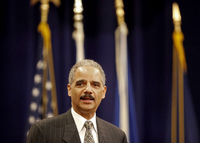Attorney General Eric Holder makes remarks commemorating African-American History Month on Wednesday at the Justice Department in Washington.  (Associated Press / The Spokesman-Review)