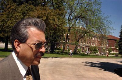 
Eastern Washington University's new president, Rodolfo Arevalo, walks across campus on Wednesday to his office. 
 (Jed Conklin / The Spokesman-Review)