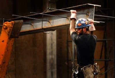 
Garco Construction ironworker Joey Poyer works on the remodel at Shadle Park High School on Thursday in Spokane. 
 (Jed Conklin / The Spokesman-Review)