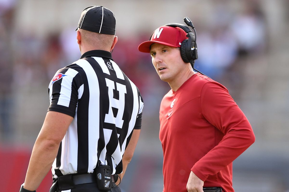Washington State Cougars head coach Jake Dickert chats with an official during the second half of a college football game on Saturday, Sept. 17, 2022, at Martin Stadium in Pullman, Wash. WSU won the game 38-7.  (Tyler Tjomsland/The Spokesman-Review)