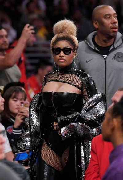 Rapper Nicki Minaj leaves during the second half of an NBA basketball game between the Los Angeles Lakers and the Houston Rockets, Tuesday, April 10, 2018, in Los Angeles. (Mark J. Terrill / Associated Press)