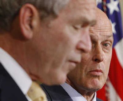 
Treasury Secretary Henry Paulson listens as President Bush makes a statement about subprime mortgages. Associated Press
 (Associated Press / The Spokesman-Review)