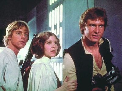 From left, Mark Hamill, Carrie Fisher and Harrison Ford battle the Empire in the original