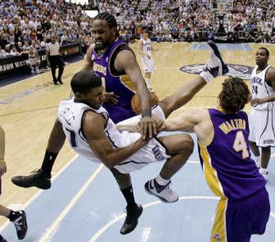 
Lakers forward Ronny Turiaf was ejected after this flagrant foul against Jazz guard Ronnie Price on Sunday.Associated Press
 (Associated Press / The Spokesman-Review)