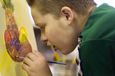 
David McBee, 13, works on his first still-life painting at Loon Lake Elementary, where he goes once a week to take painting lessons from full-time volunteer art teacher Sue Christie. McBee is homeschooled because he has Asperger's syndrome. 
 (Photos by Kathryn Stevens . / The Spokesman-Review)