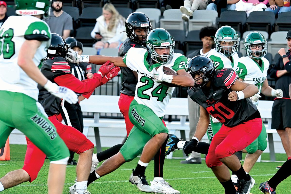 East Valley wide receiver Diezel Wilkinson picks up extra yards against North Central at ONE Spokane Stadium on Oct. 5.  (COLIN MULVANY/THE SPOKESMAN-REVIEW)