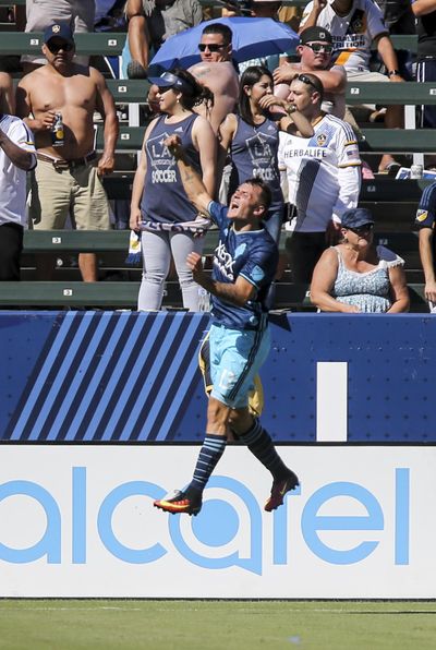 Jordan Morris scored his 11th and 12th goals of his rookie season and the Seattle Sounders beat the Los Angeles Galaxy 4-2 on Sunday to snap an 11-game road winless streak in the series. (Ringo H.W. Chiu / Associated Press)