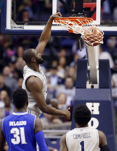 Georgetown center Tyler Adams, who has heart condition, dunks the ball. (Associated Press)