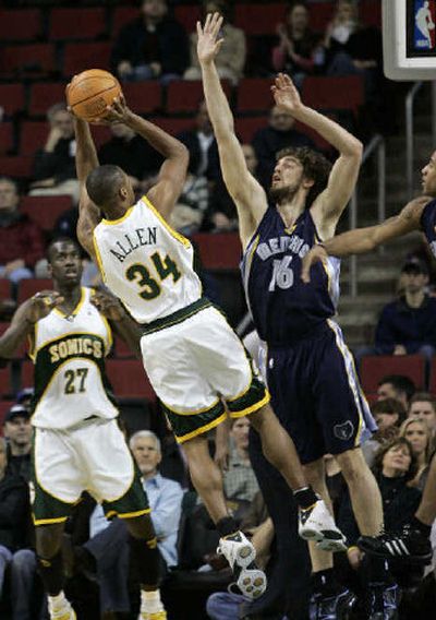 
Seattle's Ray Allen attempts to shoot over Memphis' Pau Gasol during the first half. 
 (Associated Press / The Spokesman-Review)