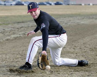 
University third baseman Danny Jordan, formerly a shortstop, digs out a ground ball with his backhand during a recent practice.
 (Dan Pelle / The Spokesman-Review)