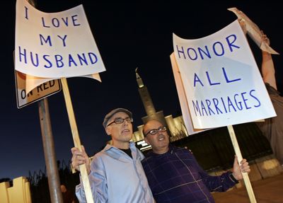 Joe Hample, left, and Barry Wendell join others as protests against the Mormon church’s alleged heavy support of Proposition 8, the anti-gay marriage initiative on the ballot approved by California voters in the Nov. 4 election, outside the Los Angeles Mormon Temple.  (Associated Press / The Spokesman-Review)