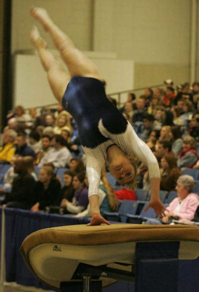 
Courtney Sexton of Central Valley performs on the vault during the state gymnastics meet.
 (Robert Sumner Special to / The Spokesman-Review)