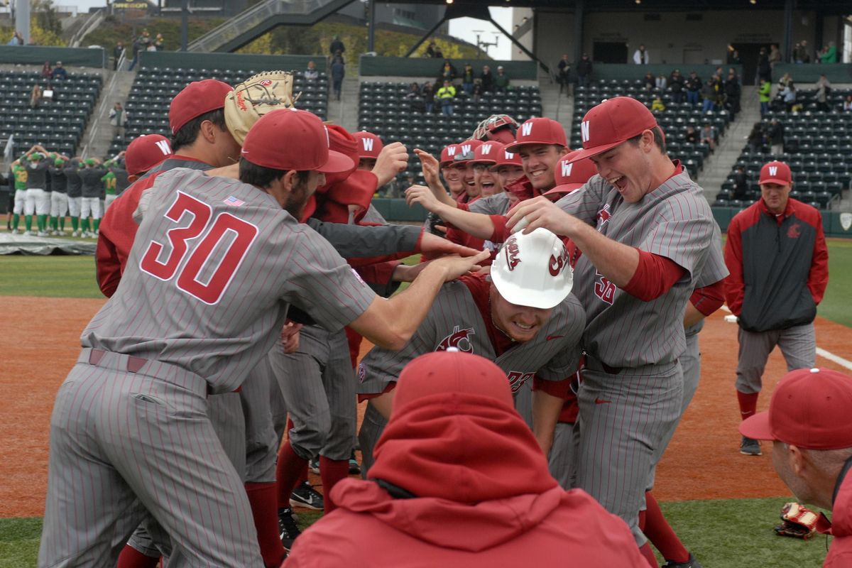 Washington State baseball players mob pitcher Scotty Sunitsch following his no-hitter against the Oregon Ducks Sunday at PK Park. (Washington State Athletics/Courtesy)