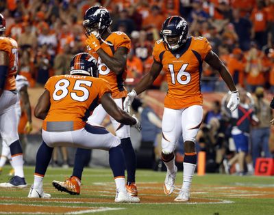 Denver Broncos wide receiver Bennie Fowler (right) celebrates his touchdown against the Los Angeles Chargers with tight end Virgil Green during Monday’s game. (Jack Dempsey / Associated Press)
