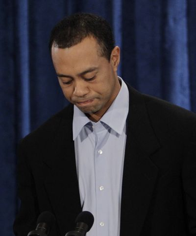  Tiger  Woods pauses during a news conference, Friday, Feb. 19, 2010, in Ponte Vedra Beach, Fla.  (Associated Press)