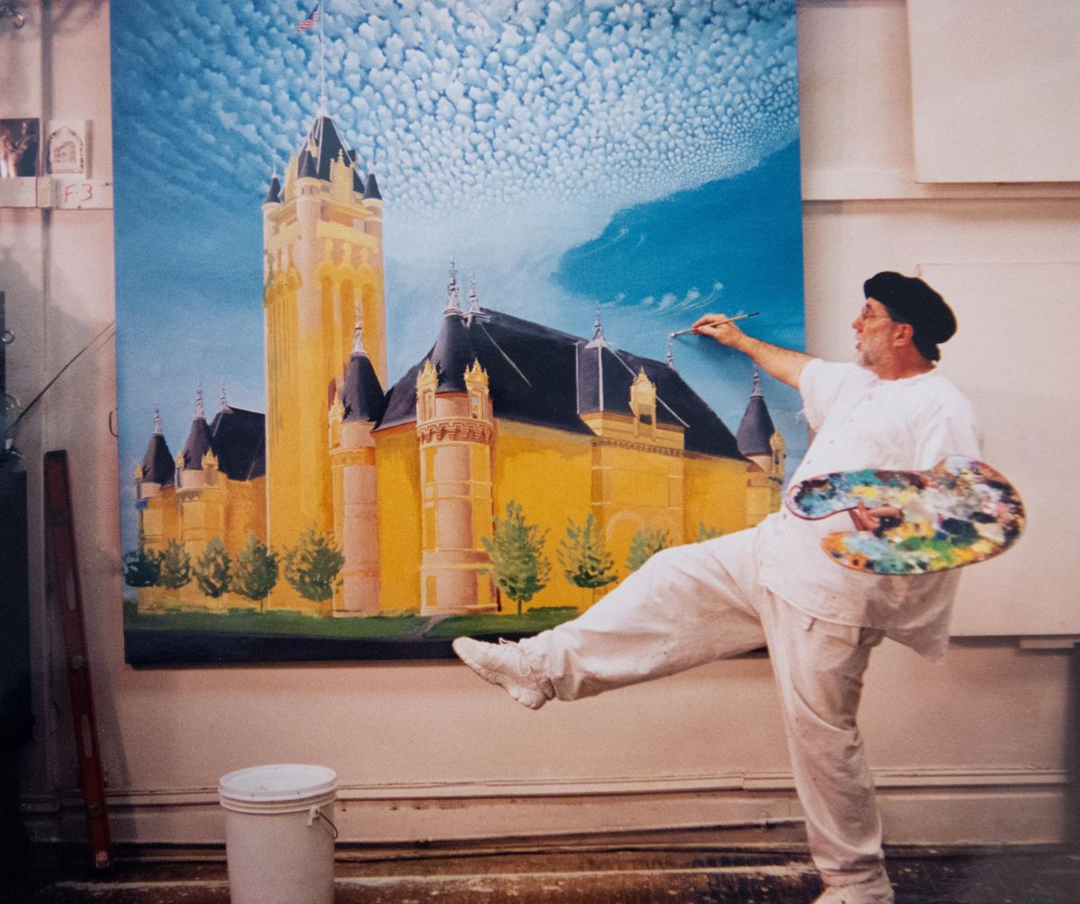 Artist James LaVigne is seen at work on a large oil painting of the Spokane County Courthouse around 1990. The image hangs in the courthouse. (LaVigne family / Courtesy)