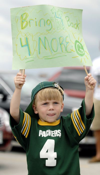 ORG XMIT: WIGRE102 Brady Blocksom, 4, from Neenah, Wis.,  shows his support to bring back Green Bay Packers quarterback Brett Favre outside Lambeau Field in Green Bay, Wis., on Sunday, July 13, 2008.  The rally was organized by brothers Adam and Erick Rolfson, and plan another on Monday night in suburban Milwaukee and every Sunday thereafter at Lambeau Field until Favre is back. (AP Photo/Green Bay Press-Gazette, Evan Siegle) (Evan Siegle / The Spokesman-Review)