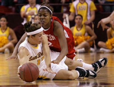
Arizona State guard Danielle Orsillo, bottom, gains control of a loose ball during the second half of her team's win.
 (Associated Press / The Spokesman-Review)