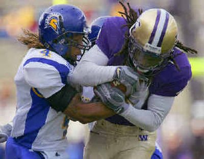 
San Jose State's Trestin George, left, fights for the ball as Washington's Charles Frederick makes a 21-yard reception.
 (Associated Press / The Spokesman-Review)