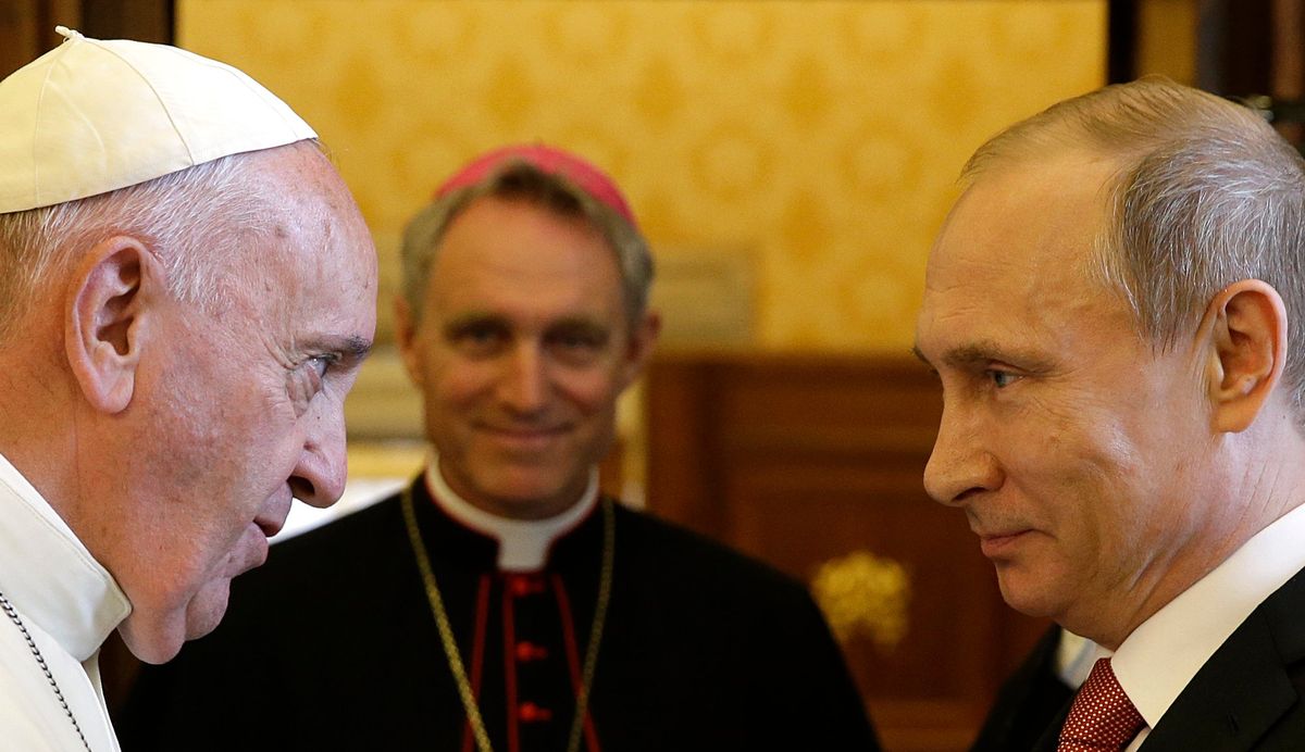 FILE - Pope Francis meets Russian President Vladimir Putin on the occasion of their private audience at the Vatican on June 10, 2015. Pope Francis went to the Russian Embassy on Friday, Feb. 25, 2022 to personally “express his concern about the war,” the Vatican said, in an extraordinary, hands-on papal gesture that has no recent precedent. Usually, popes receive ambassadors and heads of state in the Vatican, and diplomatic protocol would have called for the Vatican foreign minister to summon the ambassador.  (Gregorio Borgia)