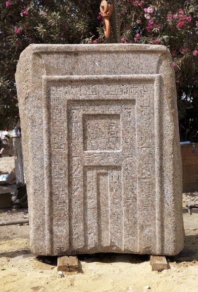 This 3,500-year-old slab of pink granite was used as a false door in the tomb of User.  (Associated Press)