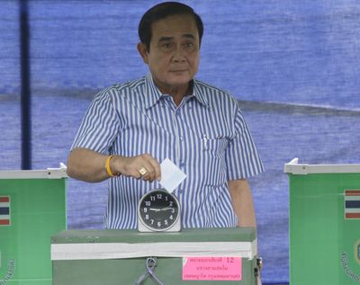 Thailand’s Prime Minister Prayuth Chan-ocha poses as he casts his vote in a referendum on a new constitution at a polling station in Bangkok, Thailand, Sunday, Aug. 7, 2016. (Sakchai Lalit / Associated Press)