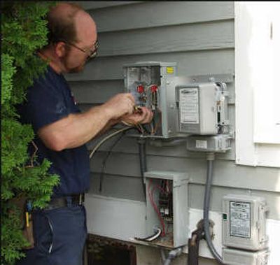 
Comverge makes a demand control unit that can be attached to the outside of a home and which controls several appliances.Comverge photo
 (Comverge photo / The Spokesman-Review)