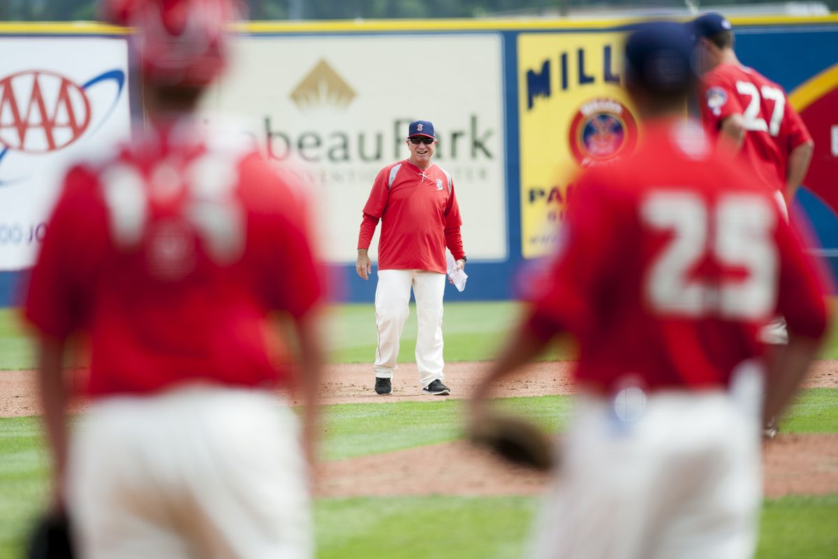 Indians manager Tim Hulett, center, sizes up his players during the first day of practice on Tuesday. Hulett returns for an eighth season at the helm. (Tyler Tjomsland)