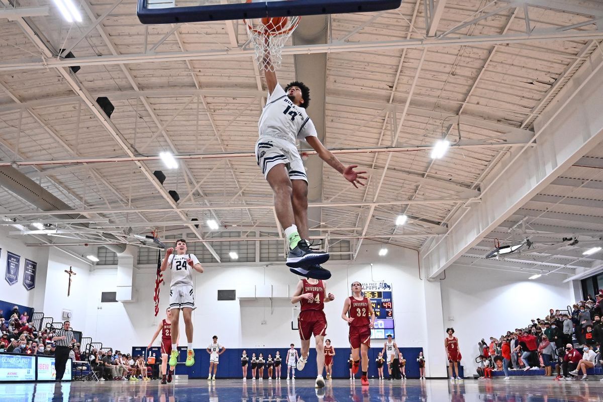 Gonzaga Prep forward Jayden Stevens dunks against visiting University on Jan. 28, 2022.   (James Snook/For The Spokesman-Review)