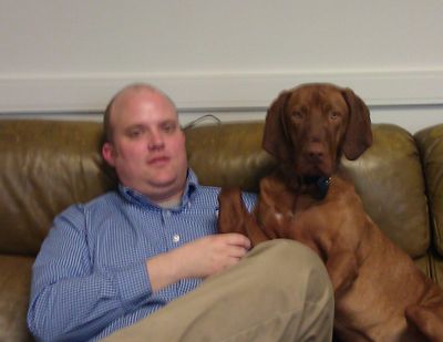 Ruger, a vizsla (pointing dog) owned by state Sen. Mark Schoesler, R-Ritzville, greets visitors to his Olympia office on Fridays. (Courtesy photo)