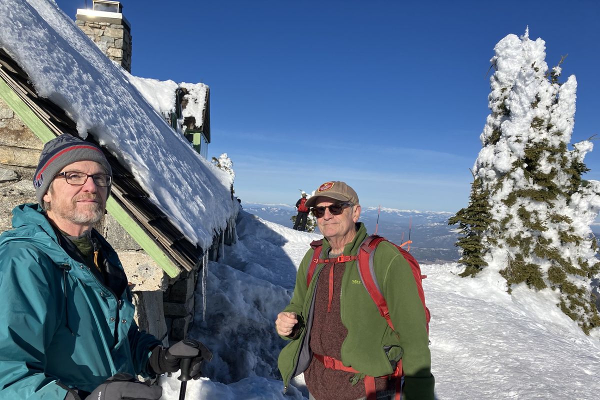 Rick Bonino, left, and Jim Kershner – the sole members of the Bonino-Kershner Hiking and Brewpub Club – ventured to the top of Mount Spokane via snowshoes a year ago. (Photo courtesy of Jim Kershner)