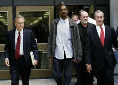 
Rapper Snoop Dogg leaves the Orange County Superior Court Thursday in Santa Ana, Calif., with his legal team. Associated Press
 (Associated Press / The Spokesman-Review)