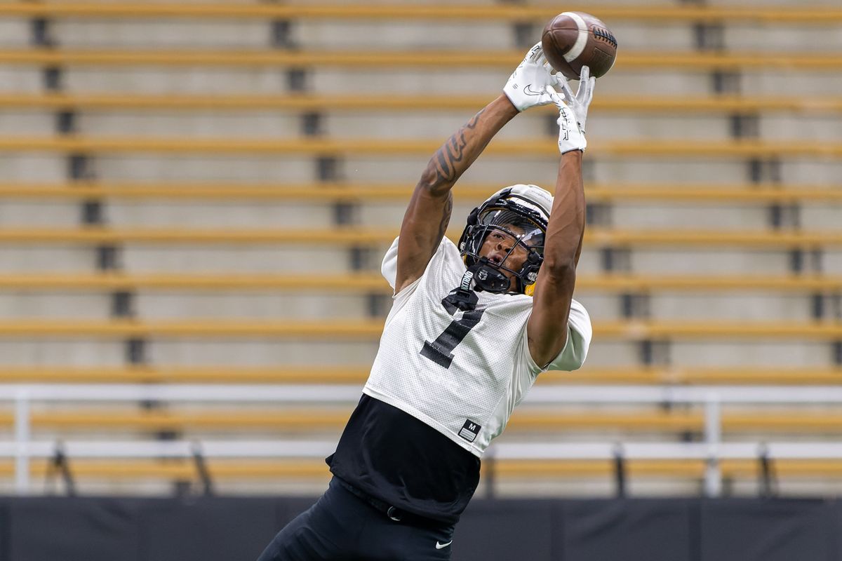 Idaho freshman wide receiver Aaron Kinsey, out of Rogers High, reaches for the ball during Thursday’s scrimmage at the Kibbie Dome in Moscow, Idaho.  (Geoff Crimmins/For The Spokesman-Review)